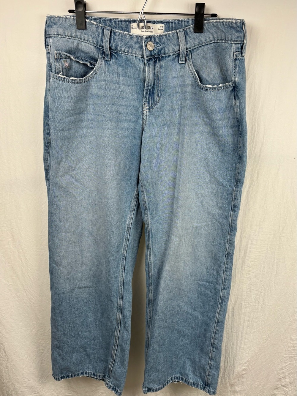 Hollister women’s 10 R low rise baggy jeans with flower embroidery faded worn in